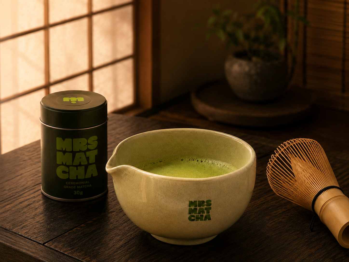 Mrs Matcha tin, bowl and whisk styled in a ritual scene